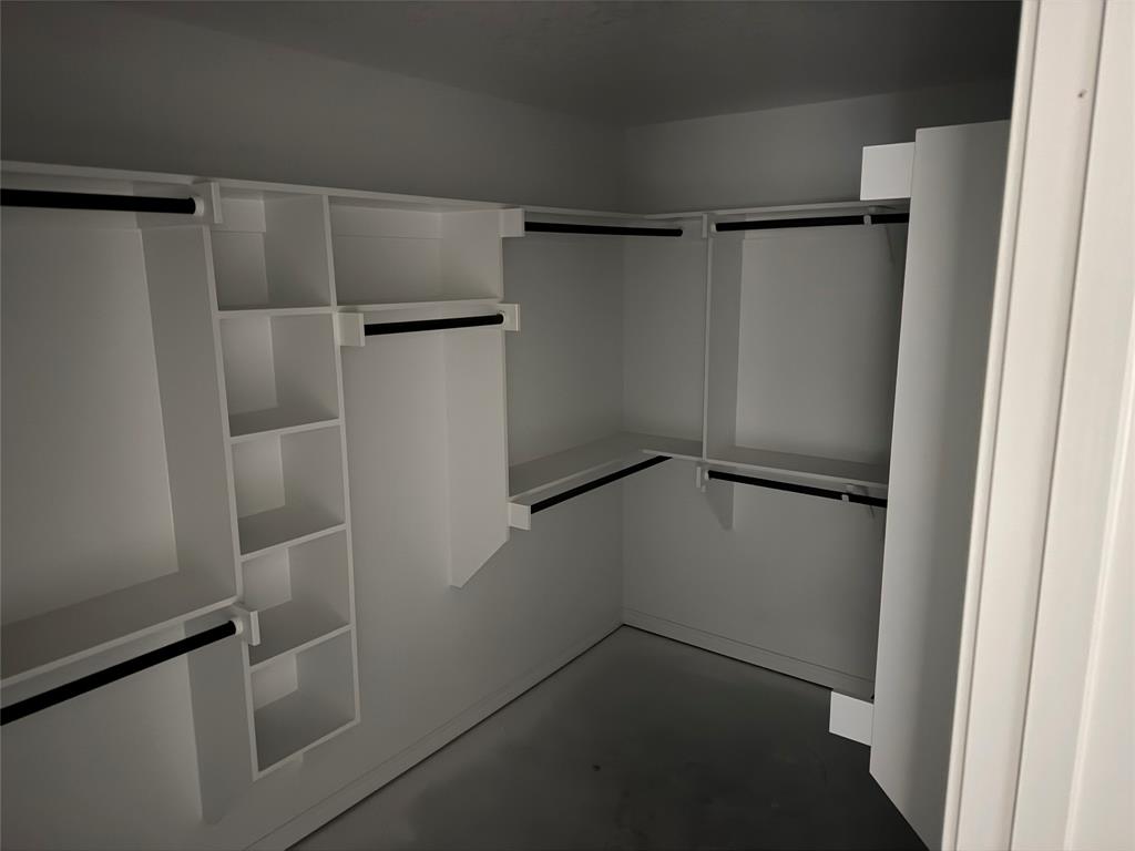 300 Myers Drive Springtown, TX 76082 - Photo 7 of 8 a view of walk in closet with empty racks
