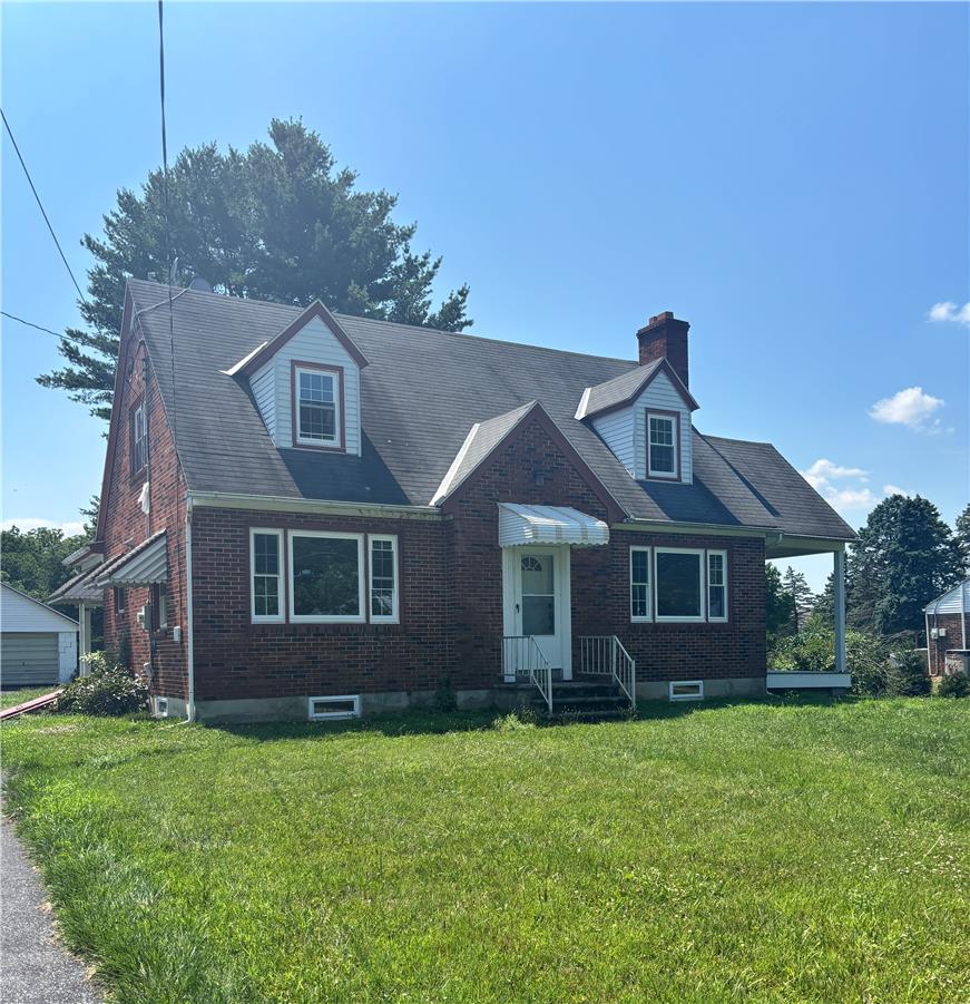 848 Hausman Road Allentown, PA 18104 - Photo 2 of 11 A charming brick exterior with contrasting white trim and a manicured front lawn awaits.