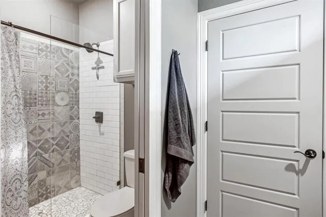 a room with gym equipment and a large window