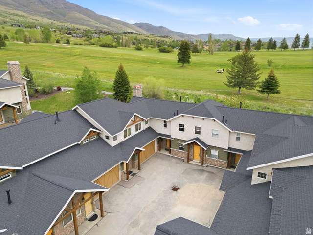 3634 North Huntsman Path, Unit C203 Eden, UT 84310 - Photo 24 of 27 Multi-unit complex featuring an asphalt shingle roof