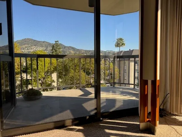 a view of swimming pool from a window