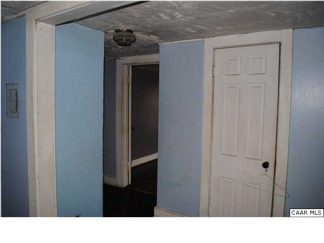 870 Black Cat Road Keswick, VA 22947 - Photo 11 of 18 a black and white wall