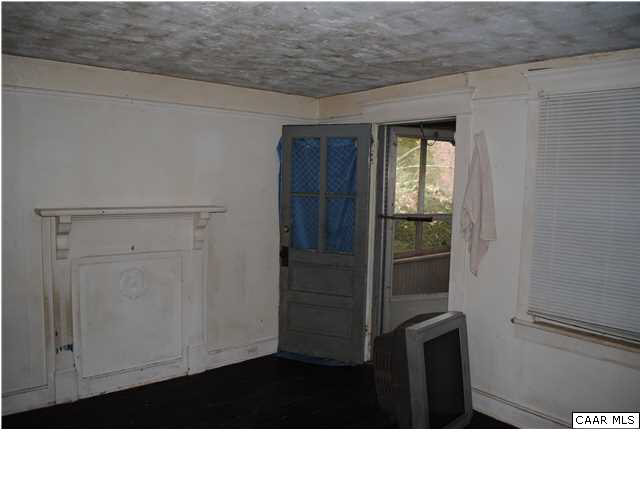 870 Black Cat Road Keswick, VA 22947 - Photo 9 of 18 a black and white photo of a cabinet