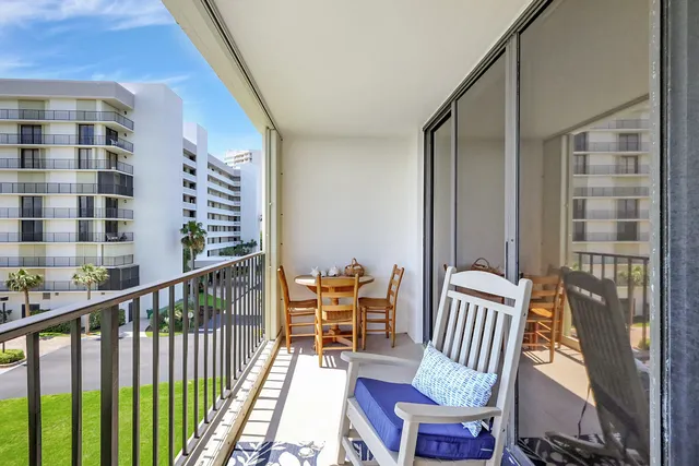 a kitchen with a sink stove and refrigerator