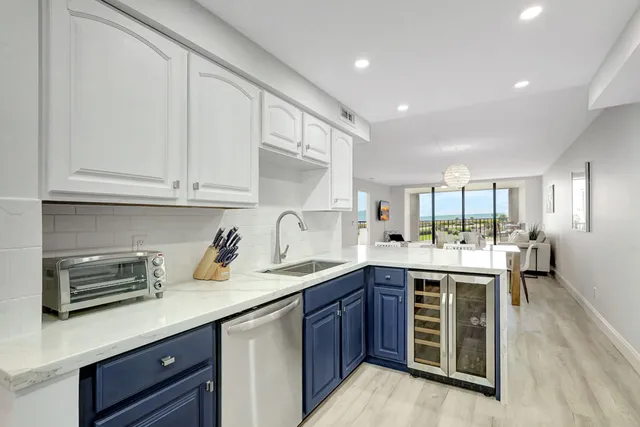 a view of a hallway with washer and dryer