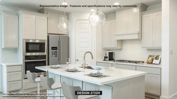 a kitchen with stainless steel appliances a sink a table and chairs