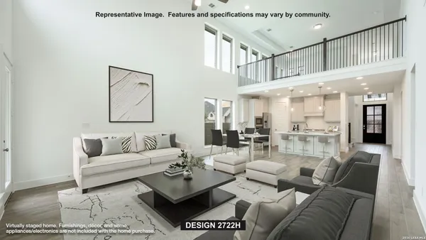 a living room with furniture wooden floor and a large window
