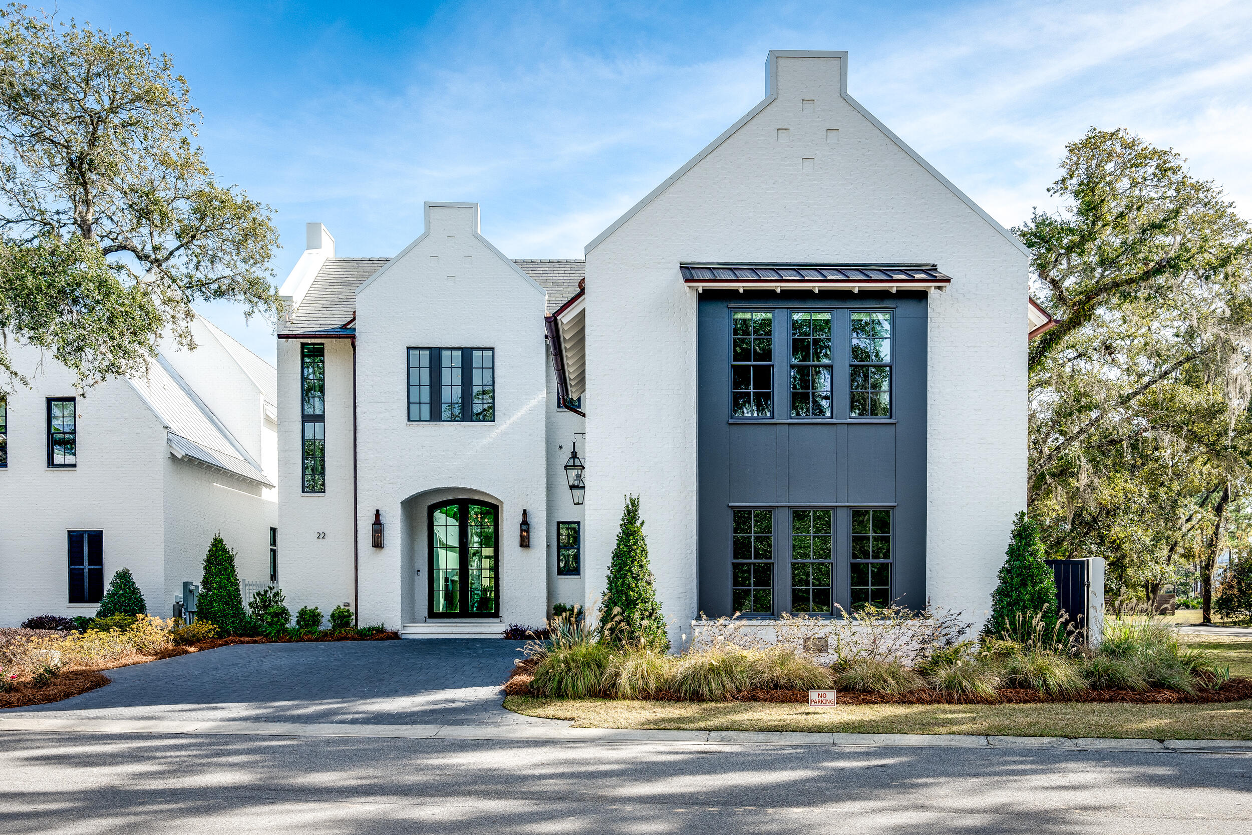 22 Junop Court Santa Rosa Beach, FL 32459 - Photo 2 of 80 a front view of a house with garden