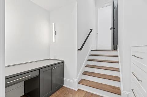 a view of balcony with wooden floor