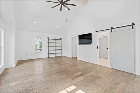 a view of a bedroom from a hallway