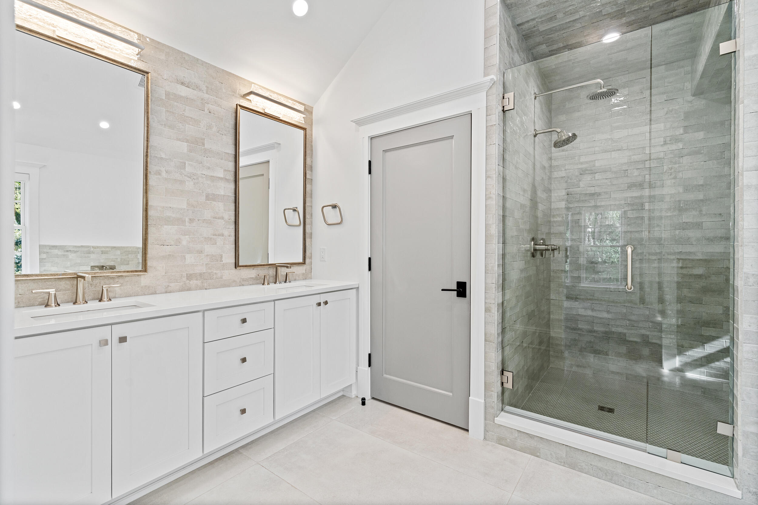 22 Junop Court Santa Rosa Beach, FL 32459 - Photo 44 of 80 a bathroom with a shower and a sink mirror