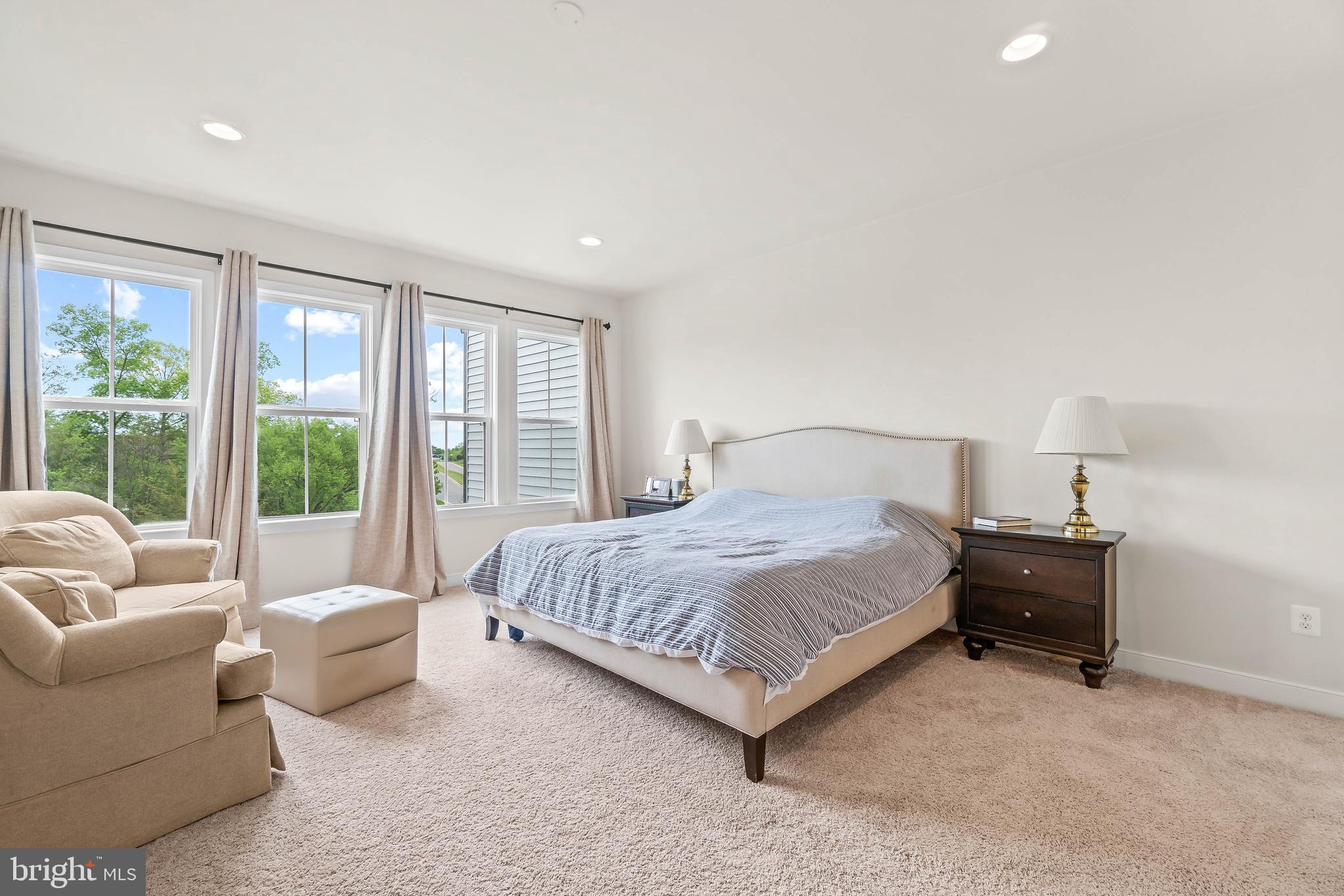 23110 Sullivans Cove Square Brambleton, VA 20148 - Photo 15 of 41 Master bedroom w/views of trees and pond