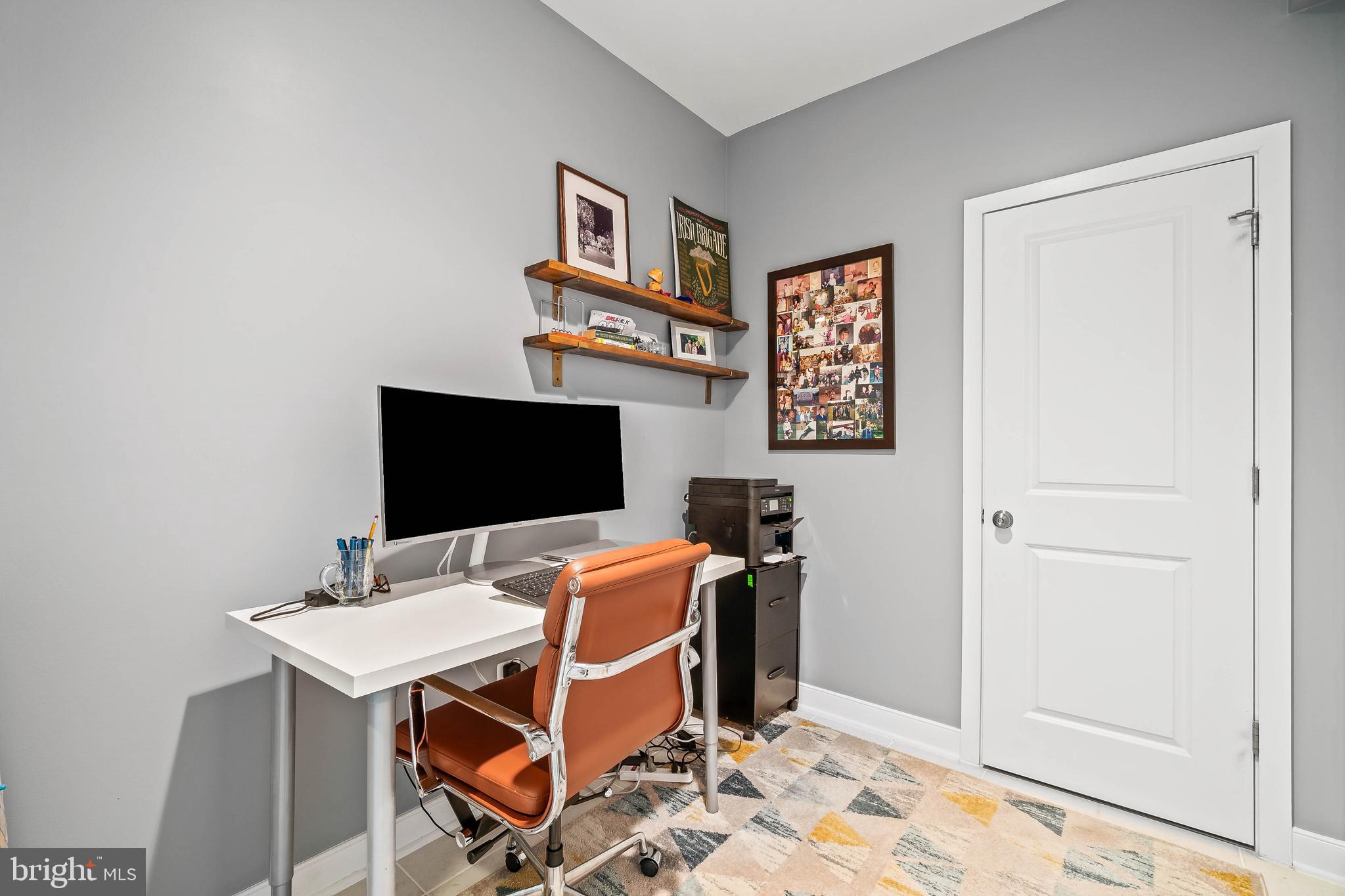 23110 Sullivans Cove Square Brambleton, VA 20148 - Photo 28 of 41 Lower level work space w/half bath