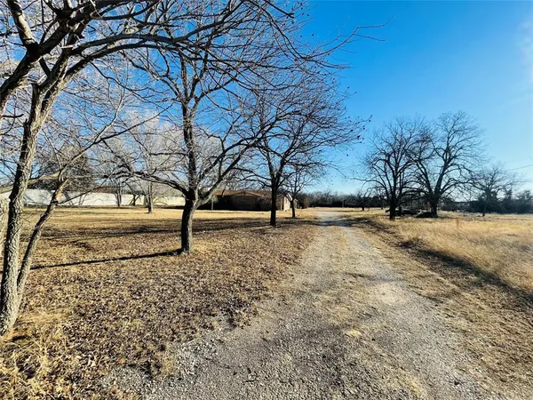a view of outdoor space with lots of trees