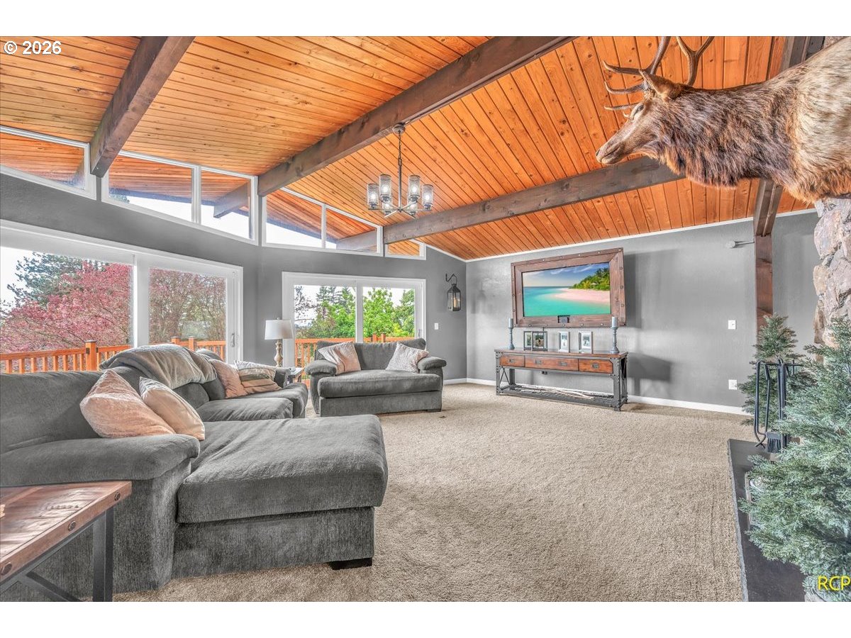 59887 Westhill Road St. Helens, OR 97051 - Photo 14 of 44 a living room with furniture and a potted plant
