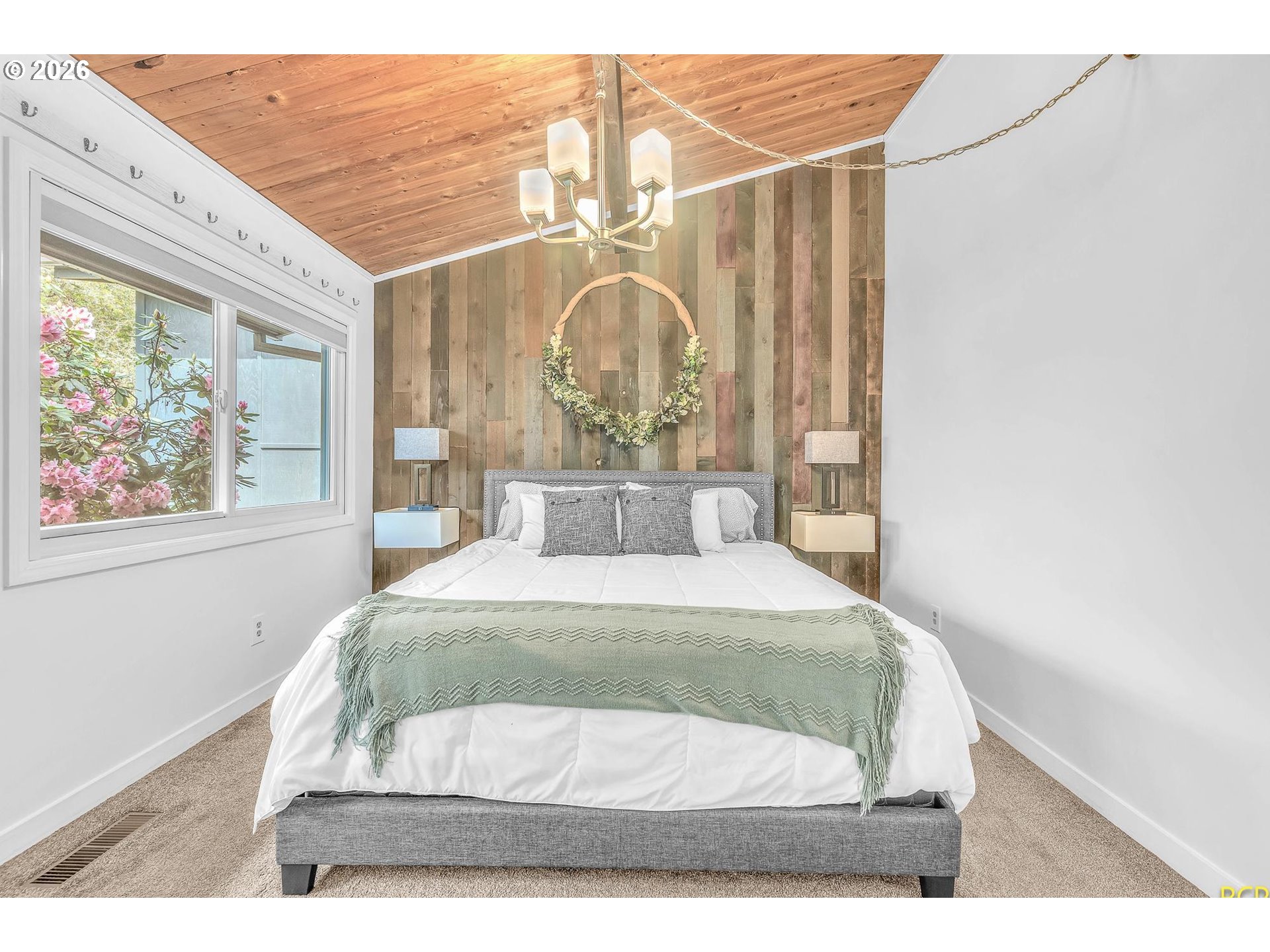 59887 Westhill Road St. Helens, OR 97051 - Photo 18 of 44 a bedroom with a bed and window