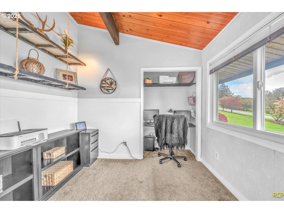 59887 Westhill Road St. Helens, OR 97051 - Photo 24 of 44 a view of a workspace with furniture and a window