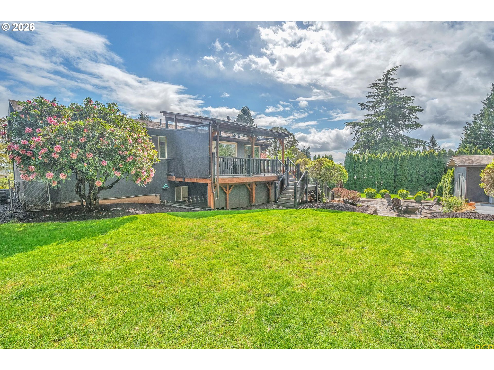59887 Westhill Road St. Helens, OR 97051 - Photo 40 of 44 a view of a house with a big yard potted plants and large tree