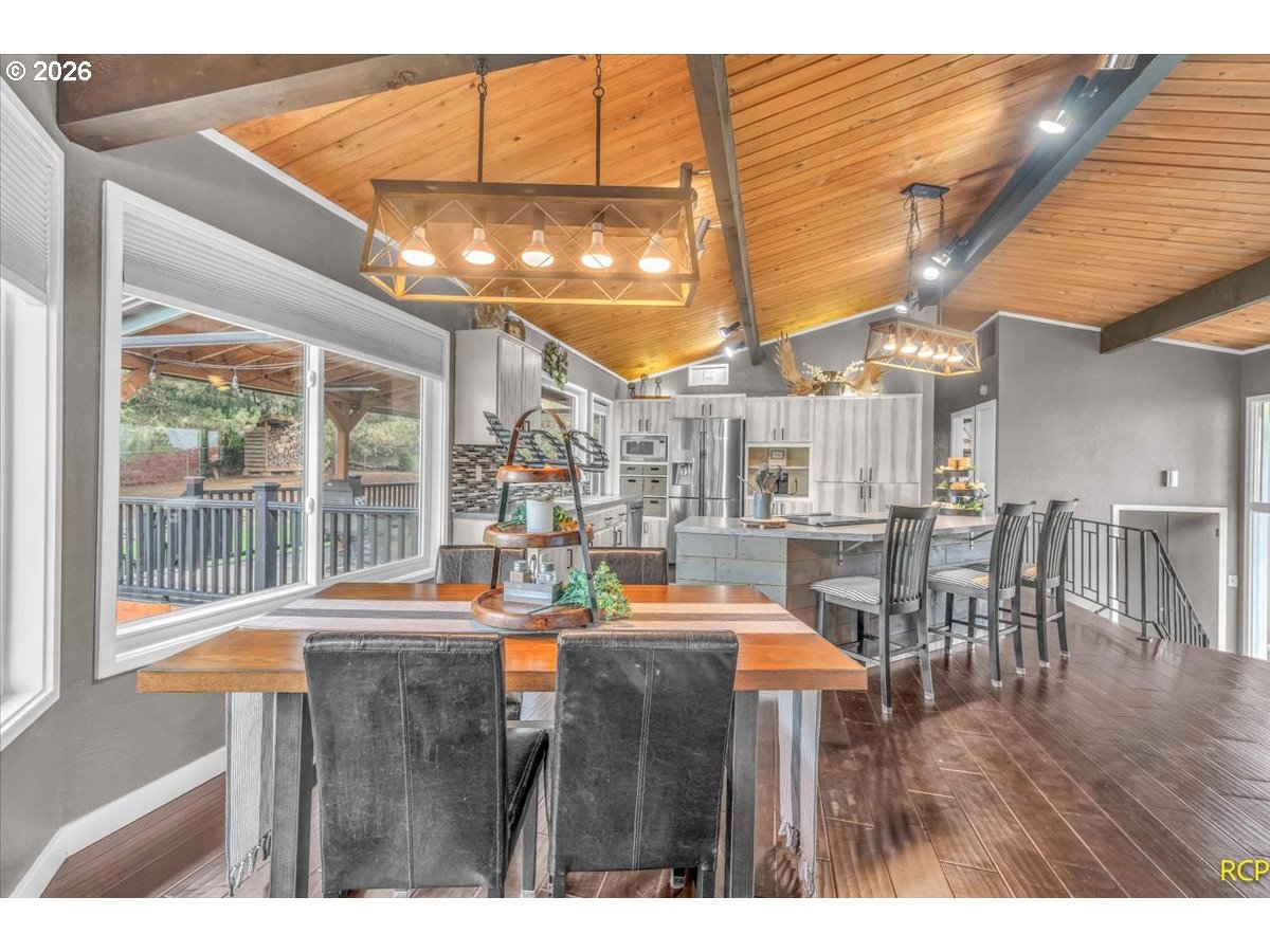 59887 Westhill Road St. Helens, OR 97051 - Photo 10 of 44 a dinning table and chairs in a room