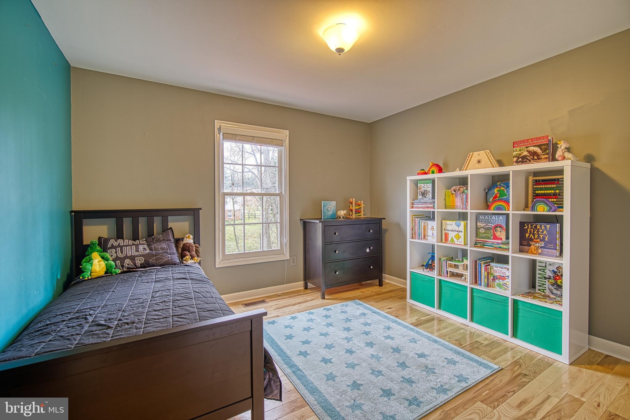14539 Cutstone Way Silver Spring, MD 20905 - Photo 23 of 34 Back corner Bedroom boasts accent wall