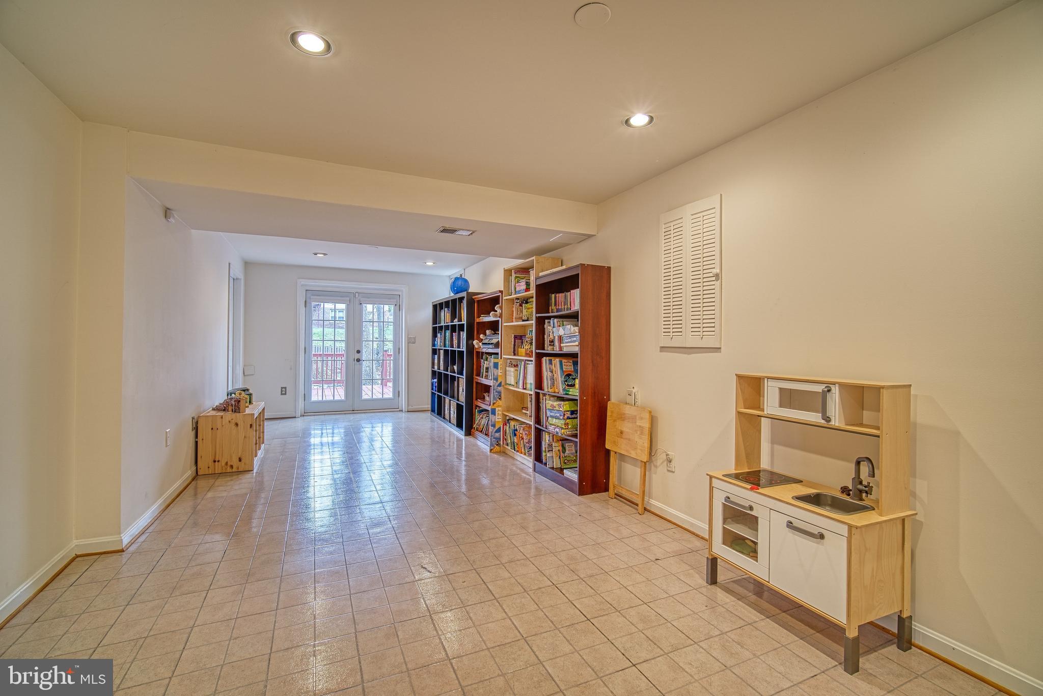 14539 Cutstone Way Silver Spring, MD 20905 - Photo 26 of 34 The lower level, with walkout, offers many options