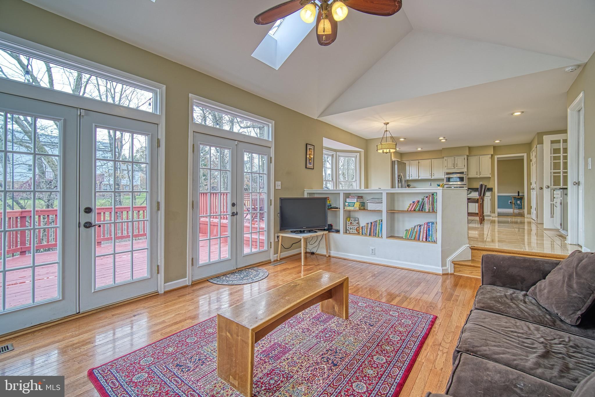 14539 Cutstone Way Silver Spring, MD 20905 - Photo 4 of 34 Wall of glass, transoms & skylights are awesome!