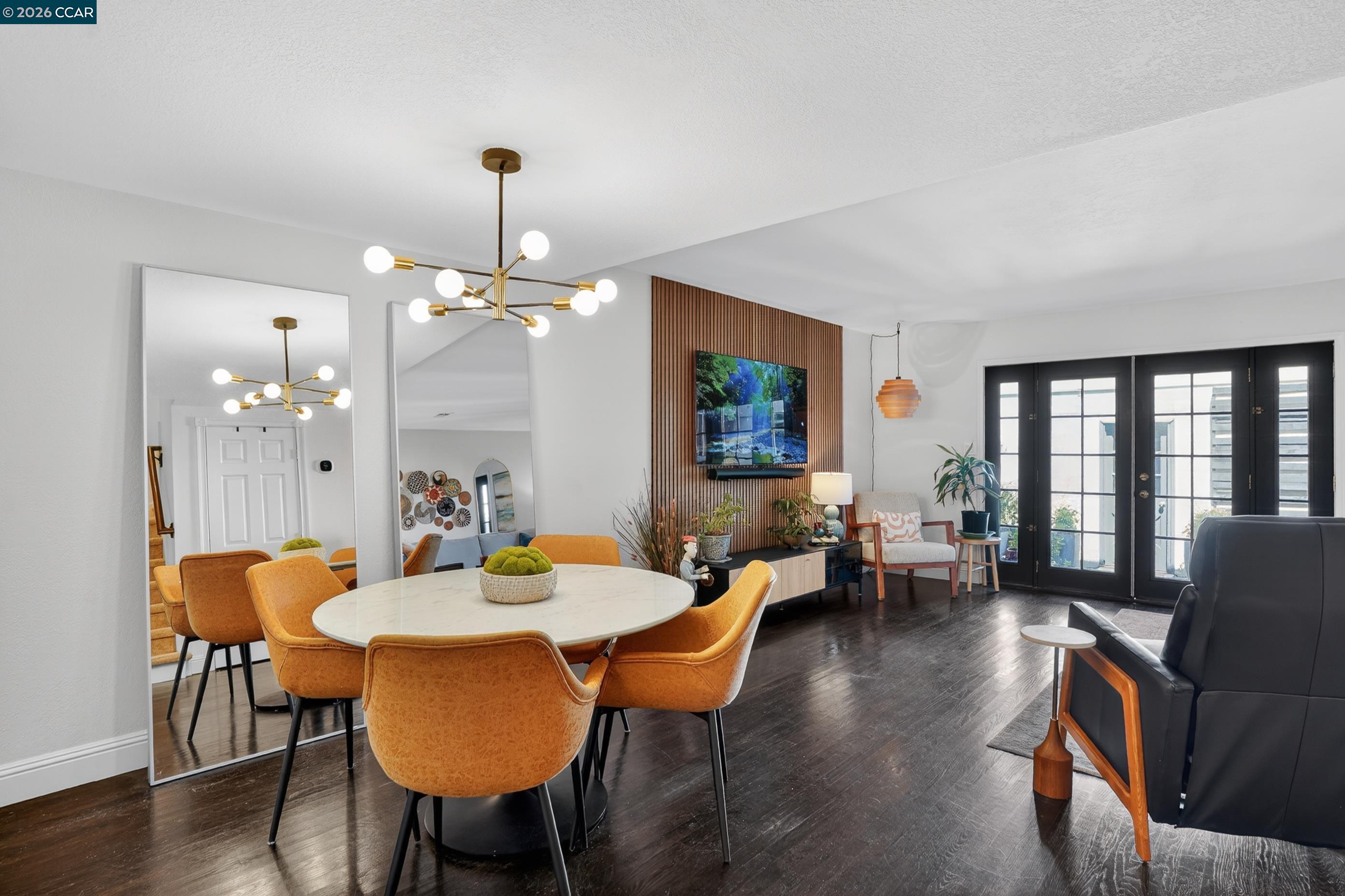 1812 Wildbrook Court, Unit C Concord, CA 94521 - Photo 3 of 35 a view of a dining room with furniture and wooden floor