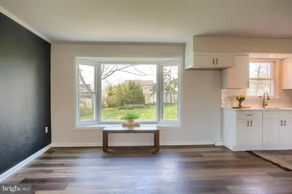 a kitchen with stainless steel appliances granite countertop a stove and refrigerator