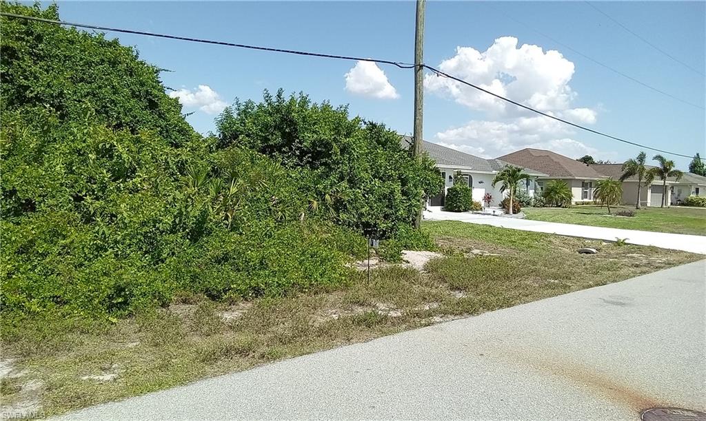 1526 Navigator Road Punta Gorda, FL 33983 - Photo 3 of 5 a view of a yard in front of a house