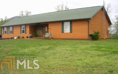 416 Mt Pleasant Church Road Cleveland, GA 30528 - Photo 1 of 1 a front view of a house with a yard