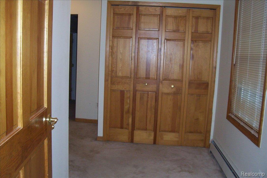 2970 North Hickory Ridge Road Highland, MI 48357 - Photo 12 of 12 master dressing room