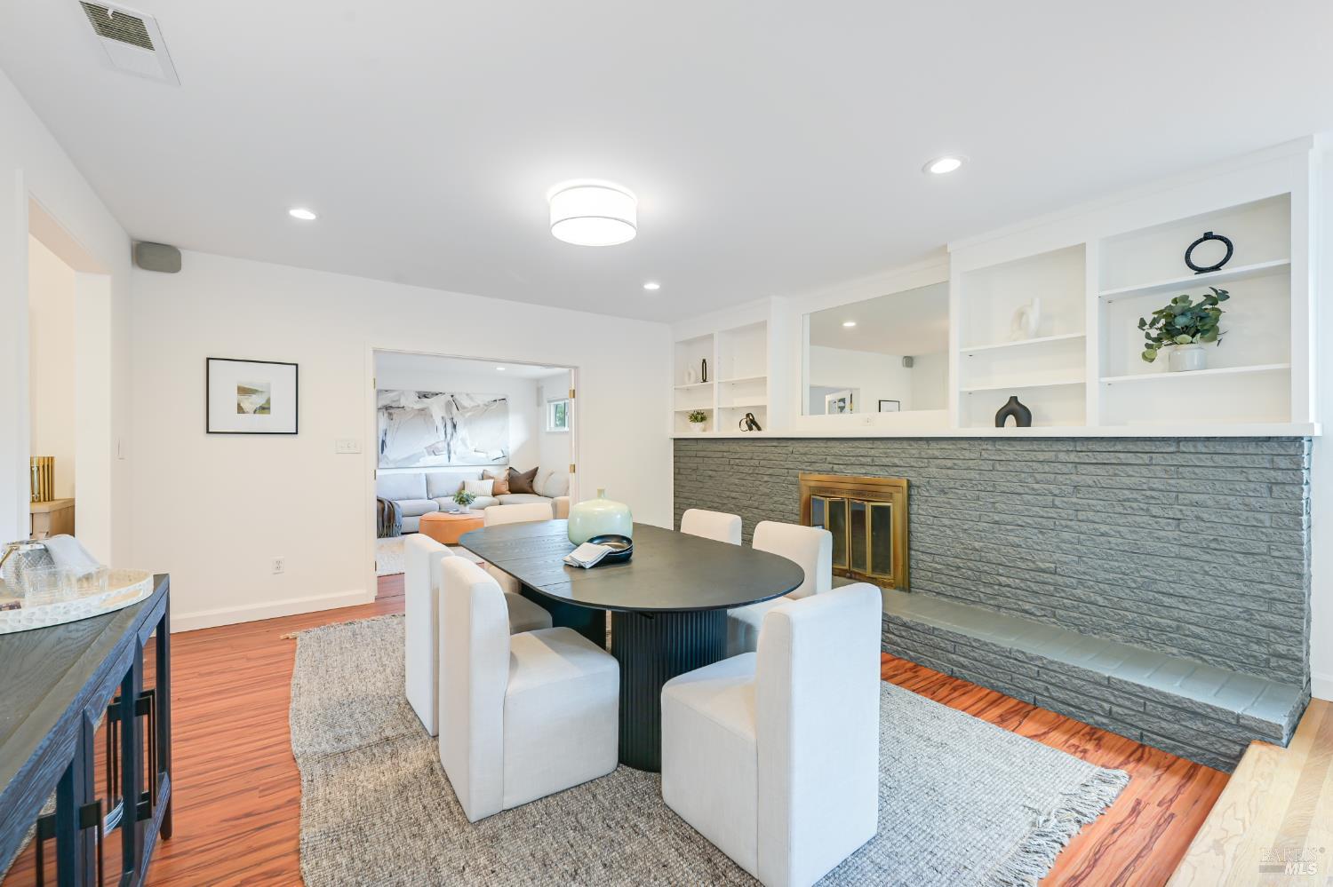 16 Wallace Way San Rafael, CA 94903 - Photo 11 of 44 a dining hall with stainless steel appliances kitchen island a table and chairs