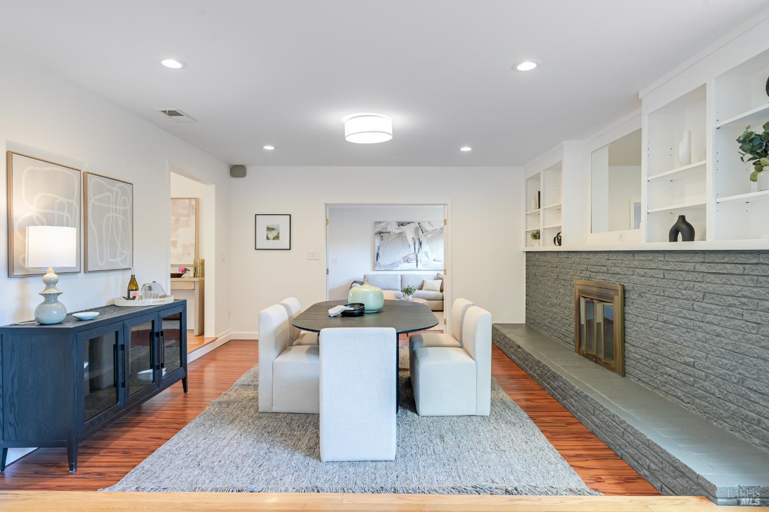16 Wallace Way San Rafael, CA 94903 - Photo 12 of 44 a living room with fireplace furniture and a rug