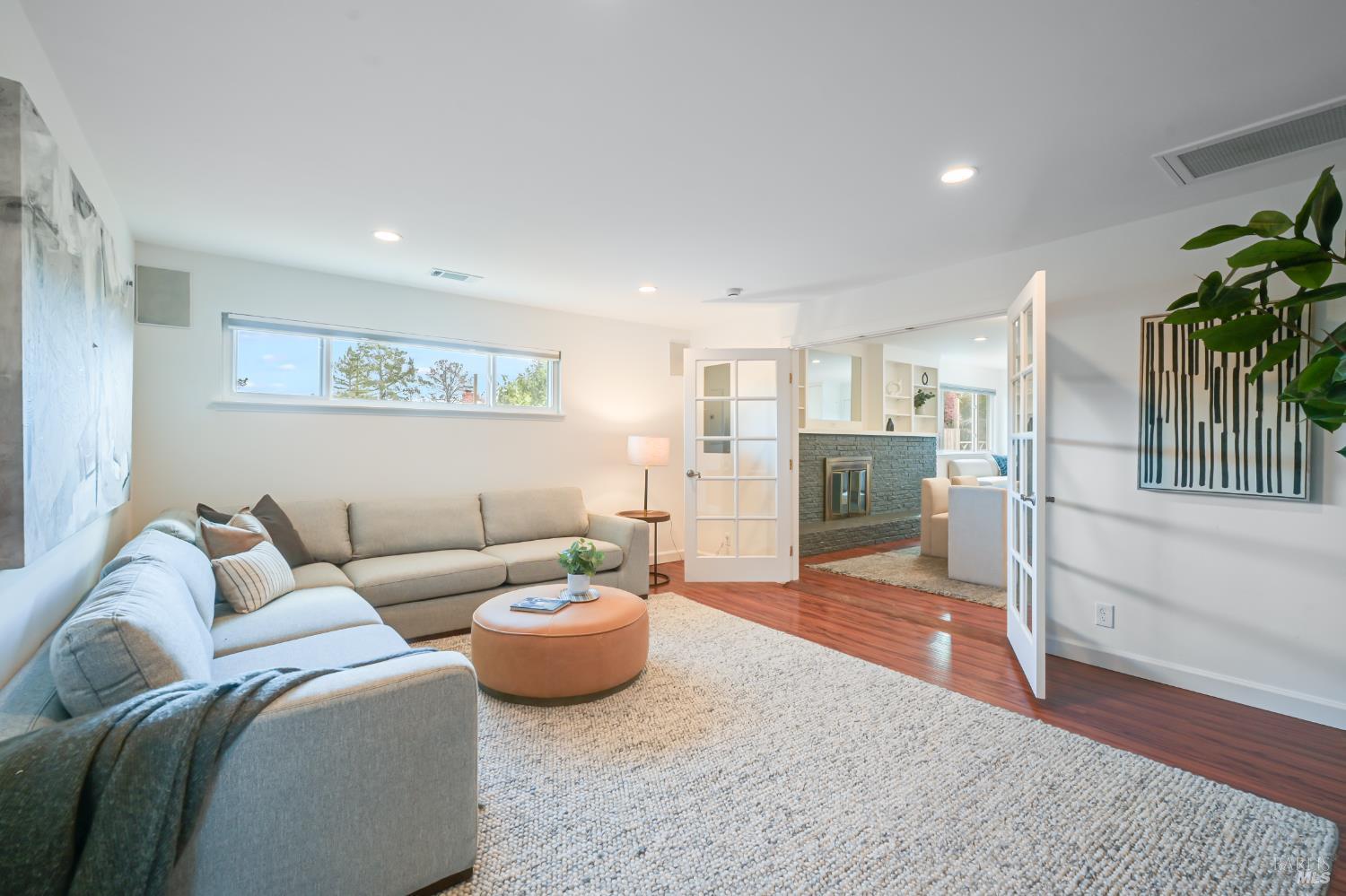16 Wallace Way San Rafael, CA 94903 - Photo 15 of 44 a living room with furniture and a couch