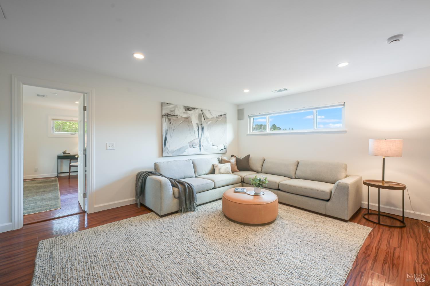 16 Wallace Way San Rafael, CA 94903 - Photo 16 of 44 a living room with furniture and wooden floor