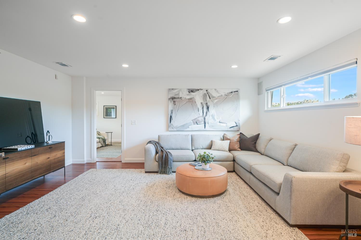 16 Wallace Way San Rafael, CA 94903 - Photo 17 of 44 a living room with furniture and a flat screen tv