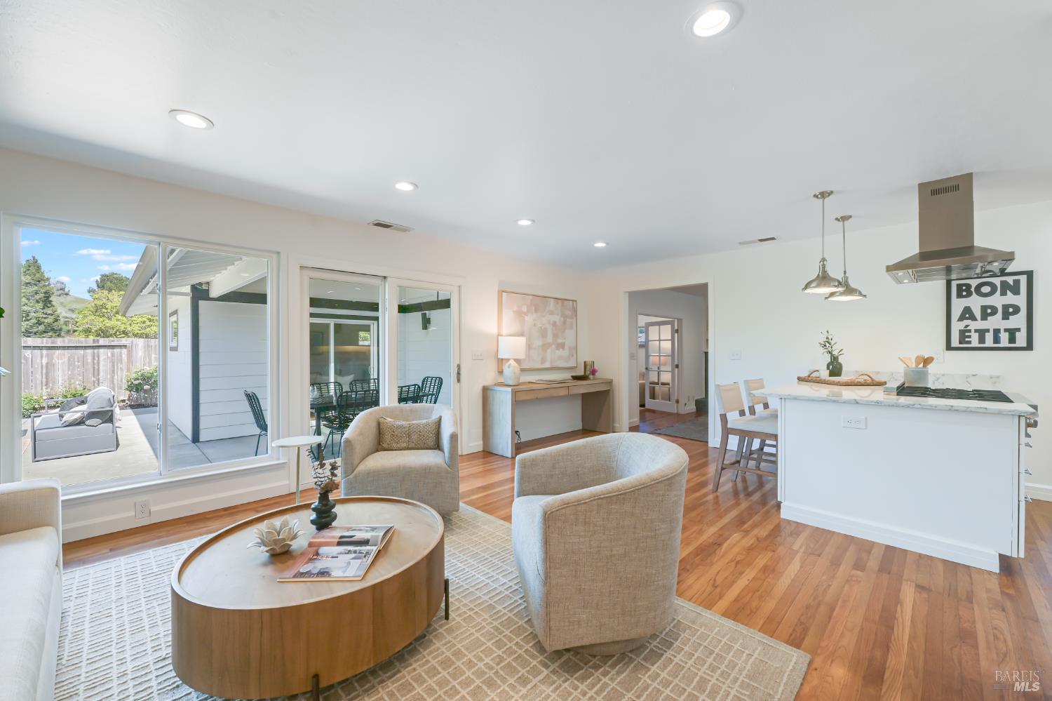 16 Wallace Way San Rafael, CA 94903 - Photo 2 of 44 a living room with furniture and a wooden floor