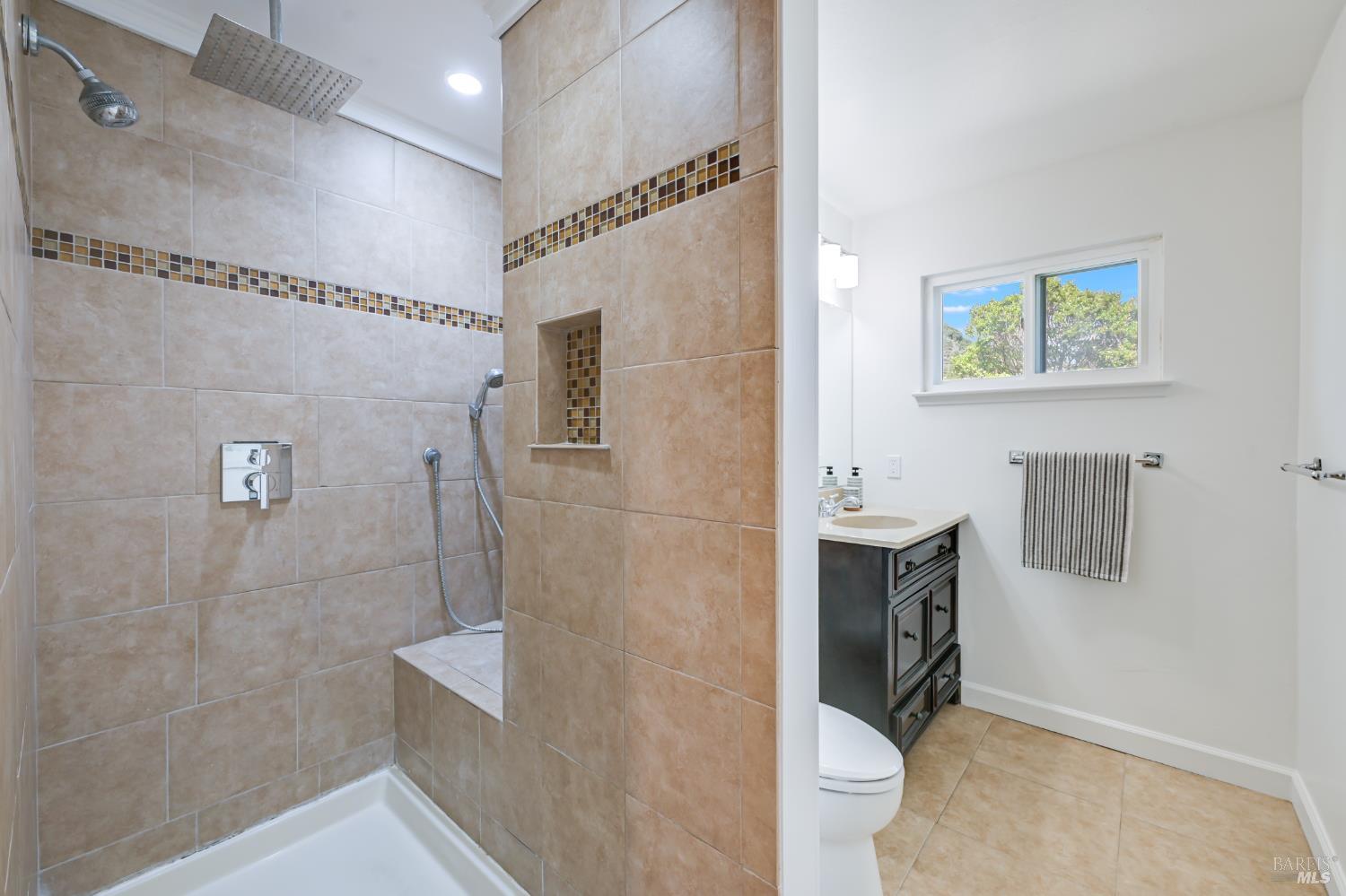 16 Wallace Way San Rafael, CA 94903 - Photo 22 of 44 a bathroom with a toilet sink and mirror