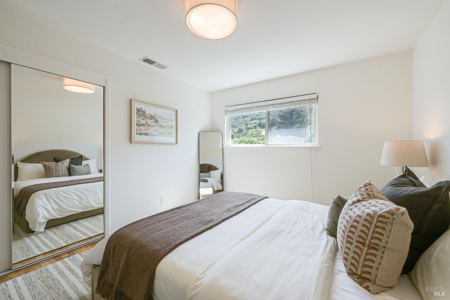 16 Wallace Way San Rafael, CA 94903 - Photo 27 of 44 a bedroom with bed and a window