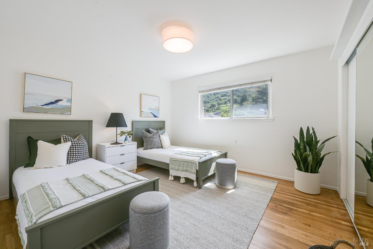 16 Wallace Way San Rafael, CA 94903 - Photo 28 of 44 a living room with furniture potted plant and a lamp