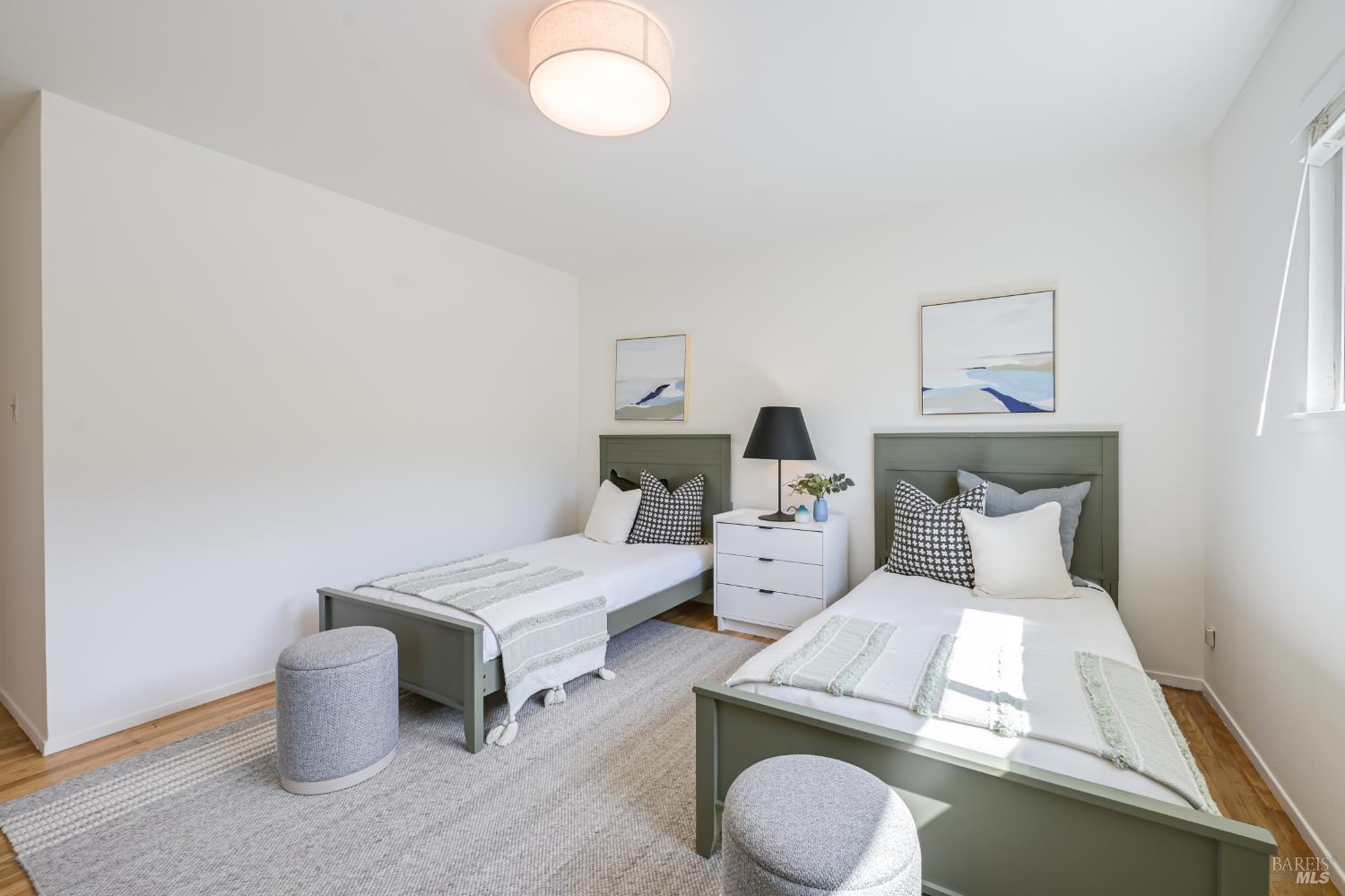 16 Wallace Way San Rafael, CA 94903 - Photo 29 of 44 a bedroom with a bed and window