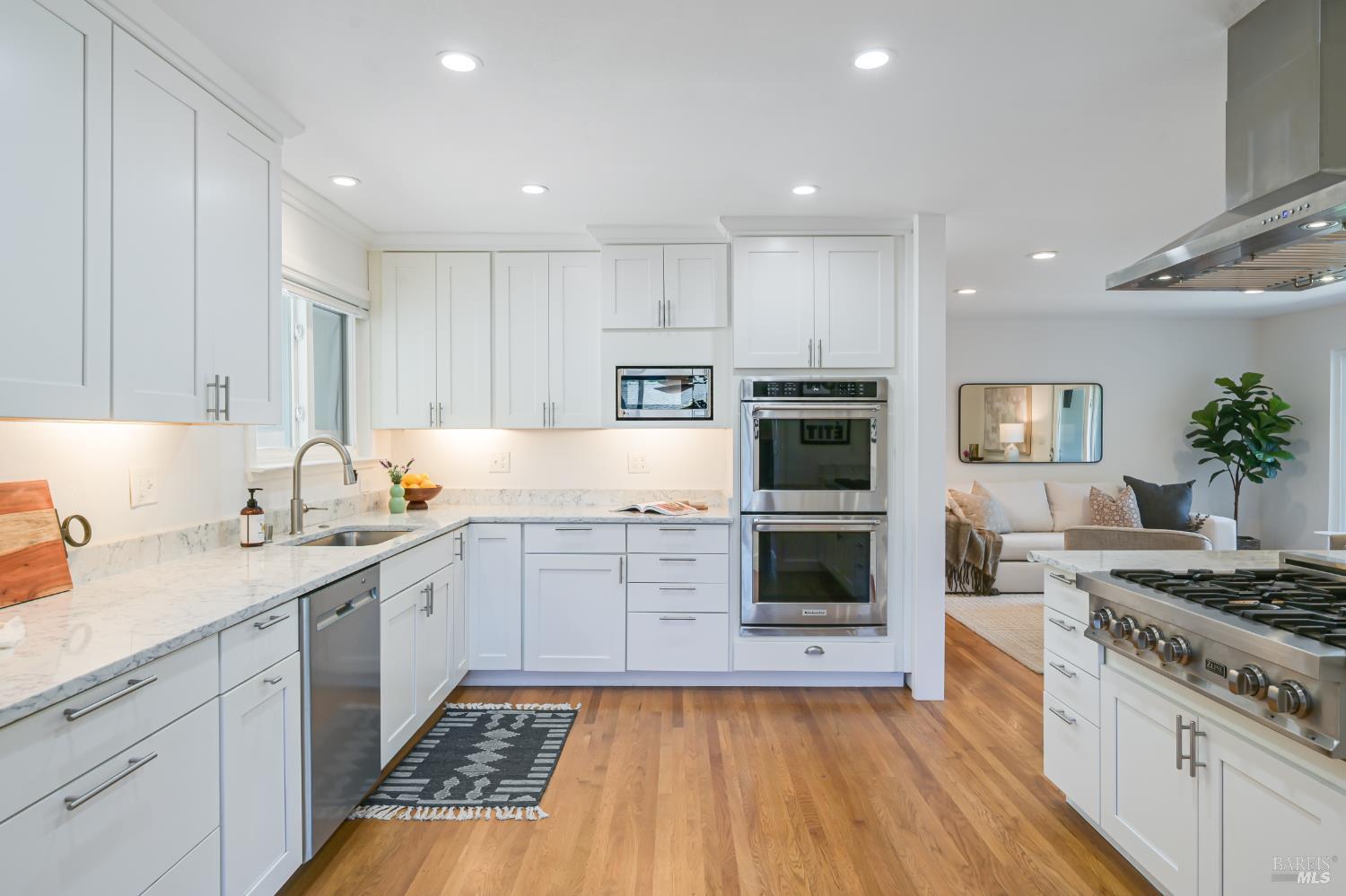 16 Wallace Way San Rafael, CA 94903 - Photo 3 of 44 a kitchen with a sink stove and cabinets