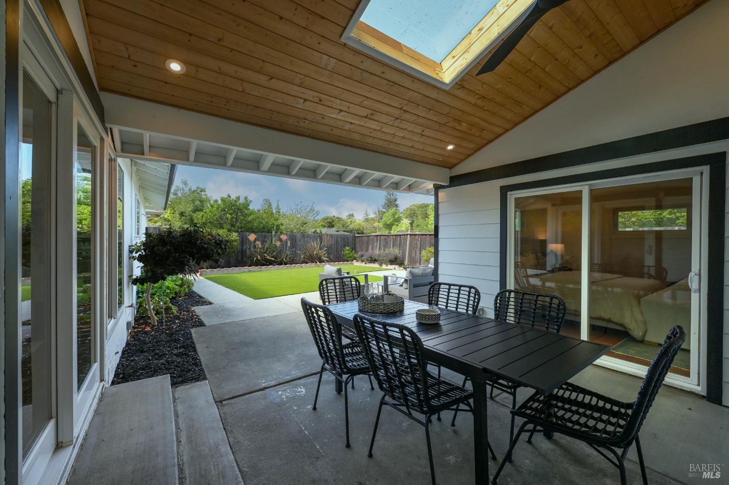 16 Wallace Way San Rafael, CA 94903 - Photo 37 of 44 a view of a patio with table and chairs and potted plants