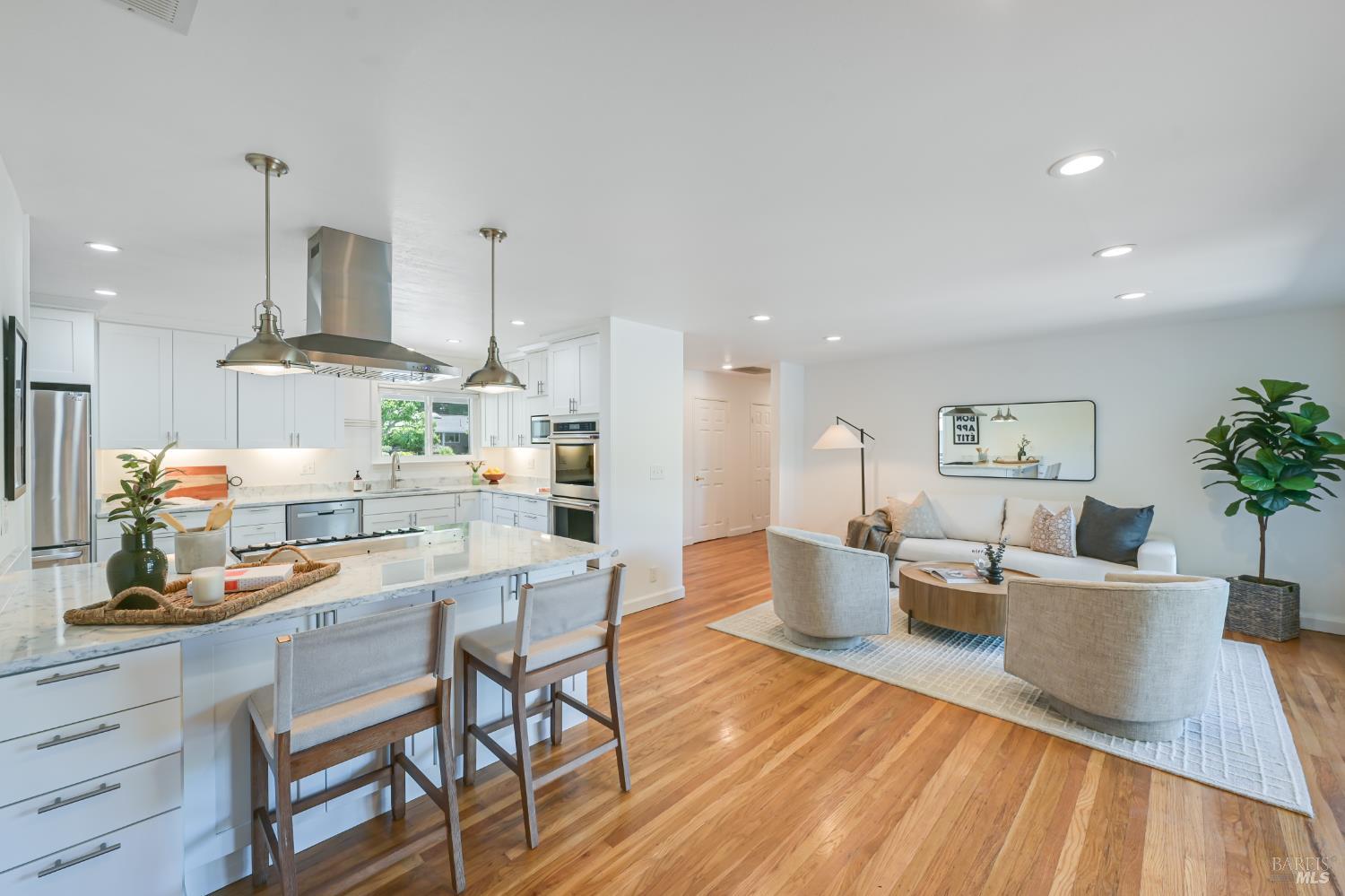 16 Wallace Way San Rafael, CA 94903 - Photo 4 of 44 a dining room with furniture and wooden floor