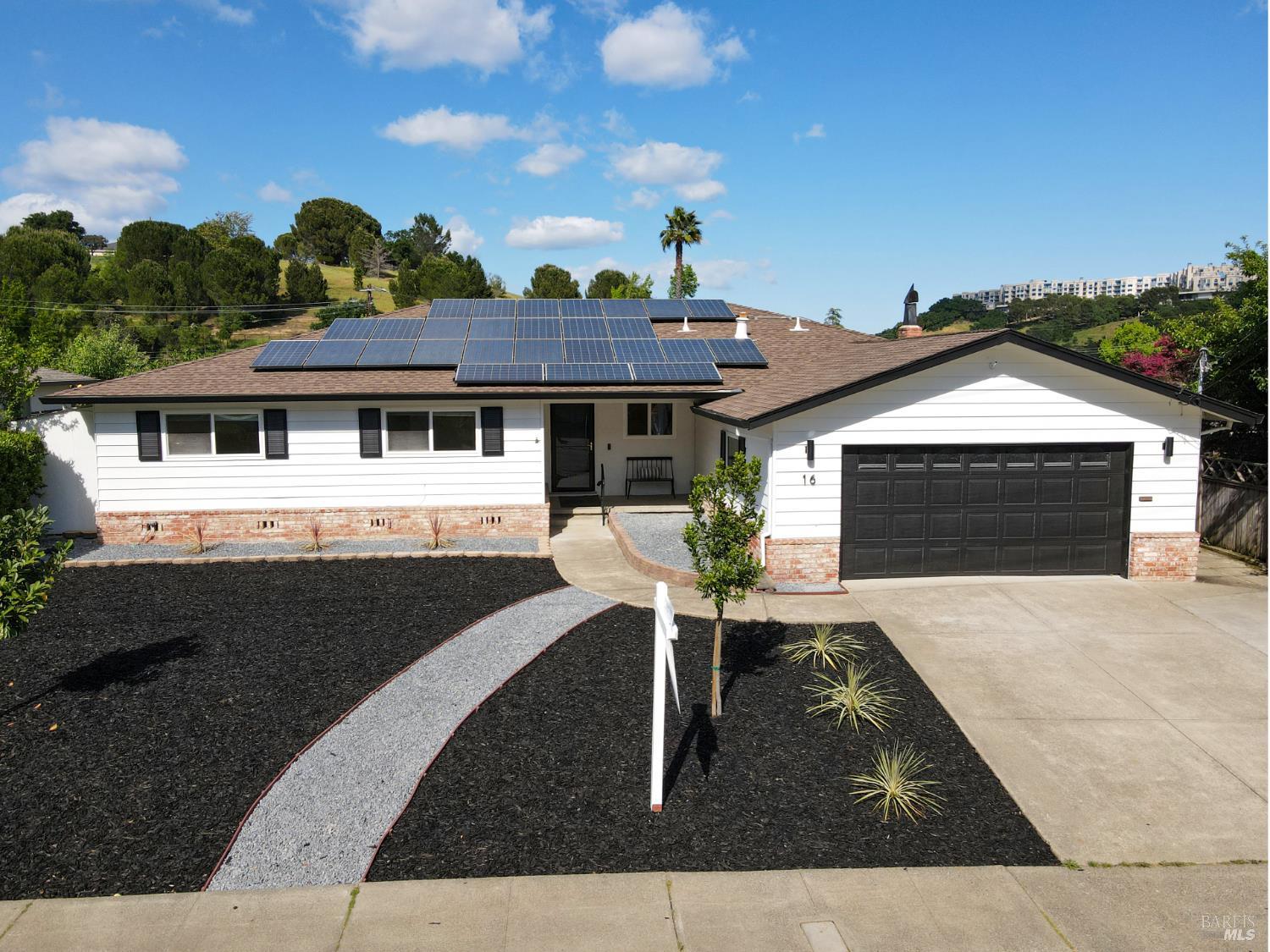 16 Wallace Way San Rafael, CA 94903 - Photo 41 of 44 a front view of a house with a yard and garage