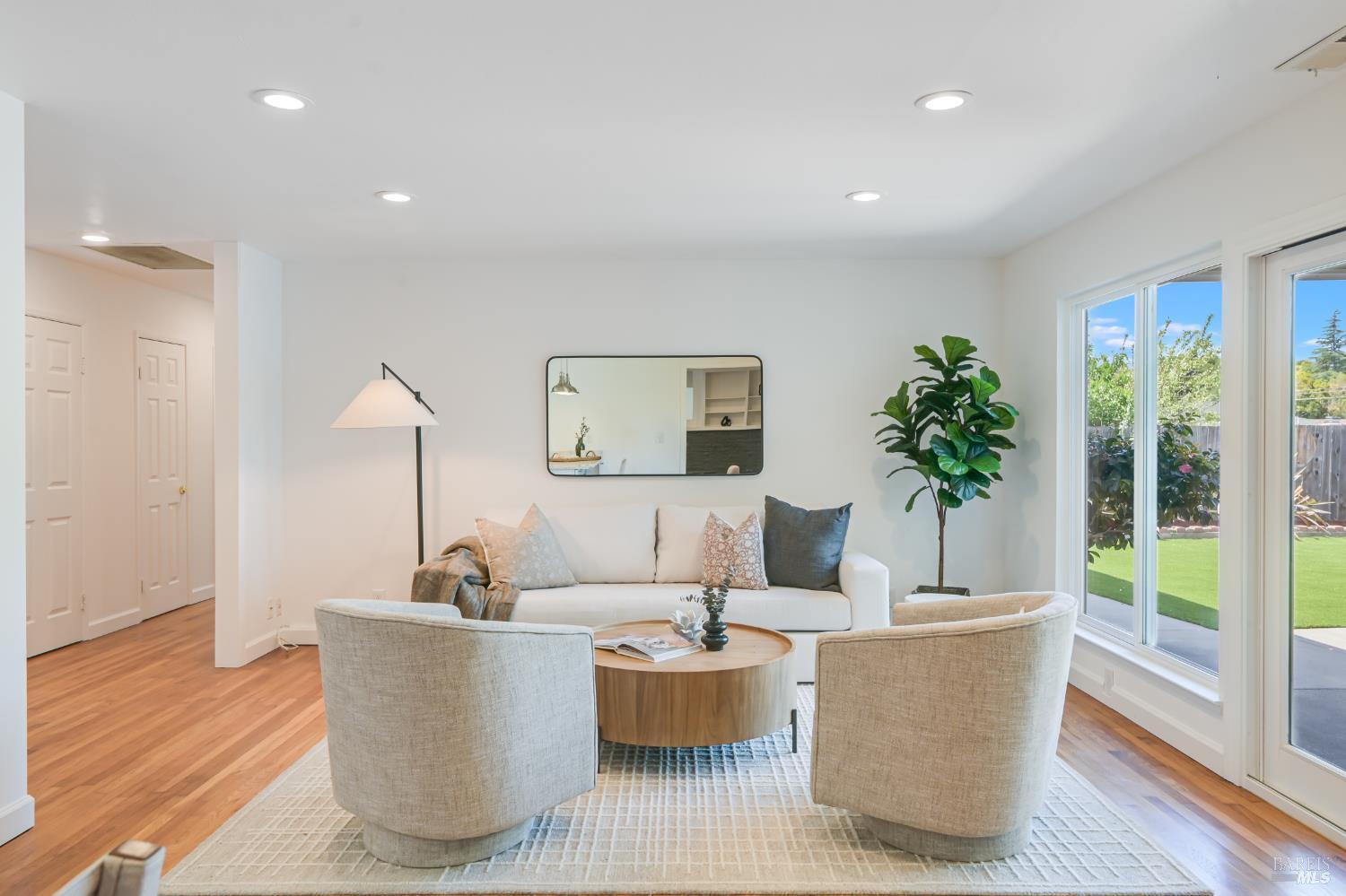 16 Wallace Way San Rafael, CA 94903 - Photo 5 of 44 a living room with furniture and a potted plant