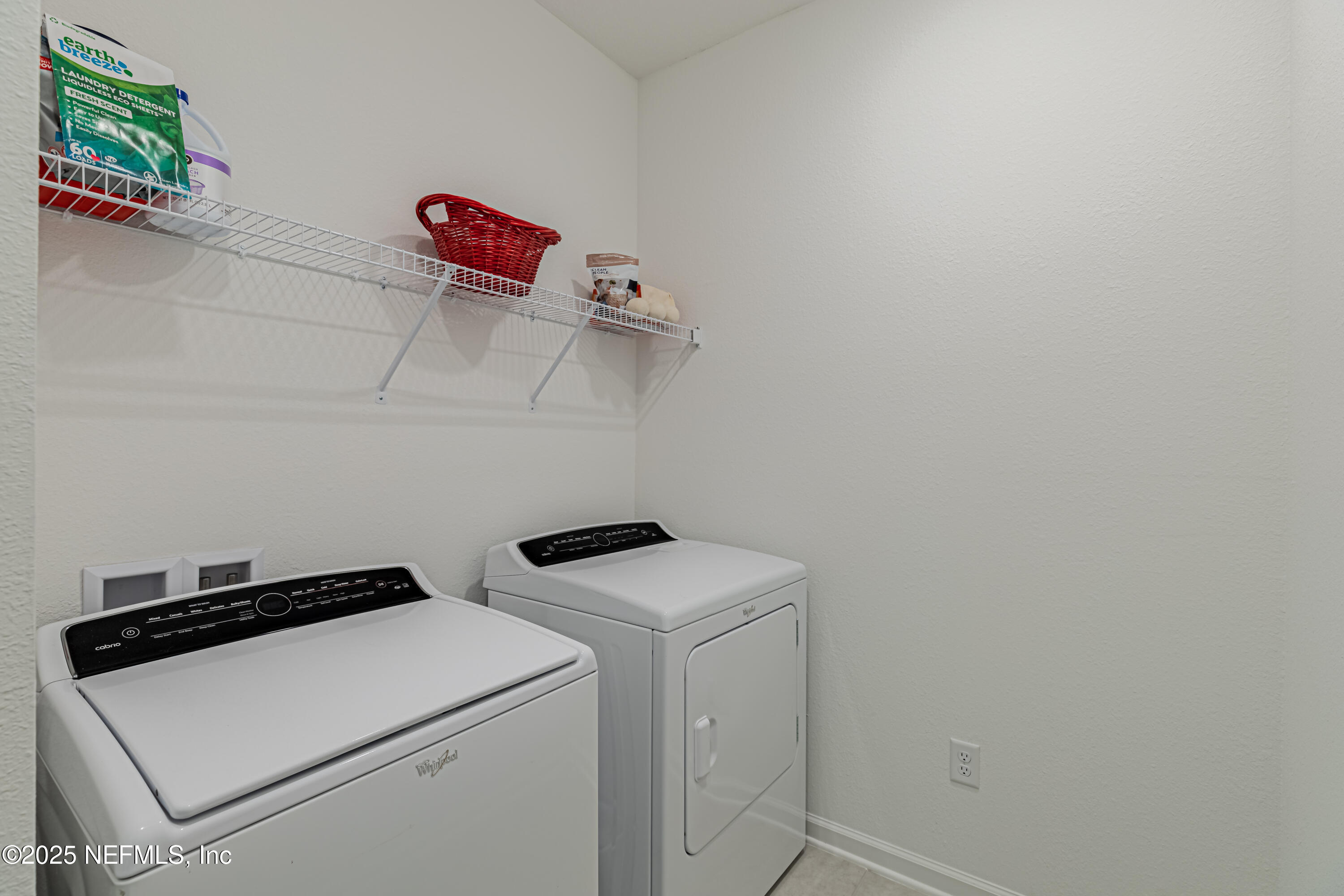 383 Windswept Way Street St. Augustine, FL 32092 - Photo 28 of 34 a utility room with dryer and washer