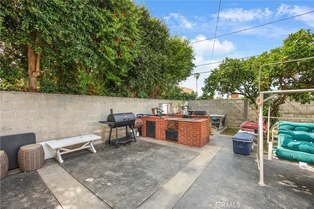 a view of pool with a yard