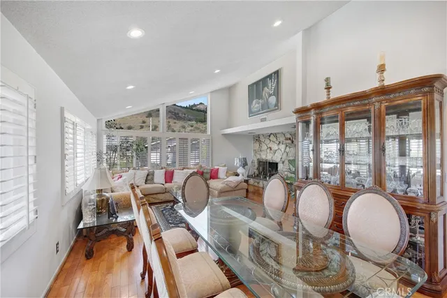 a very nice looking living room with a large window
