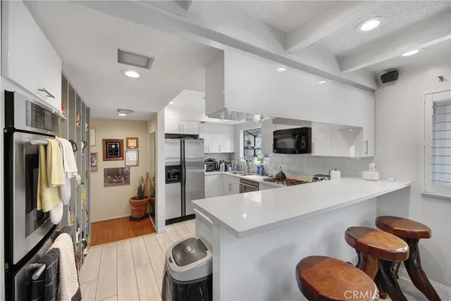 a view of a hallway with white walls